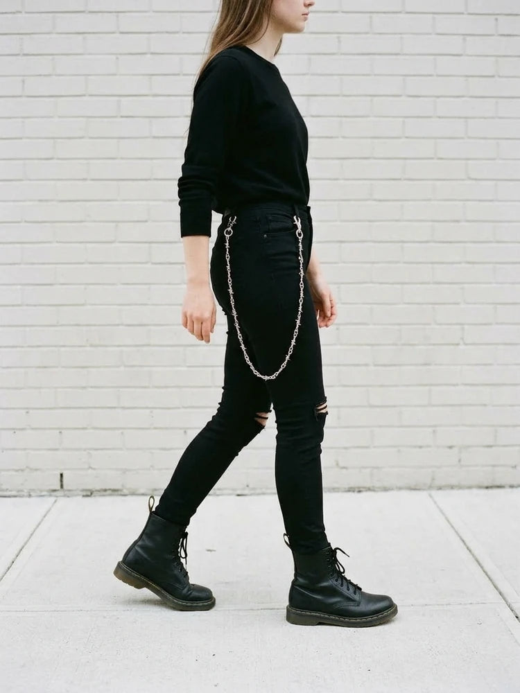 Punk outfit with barbed wire pants chain, women