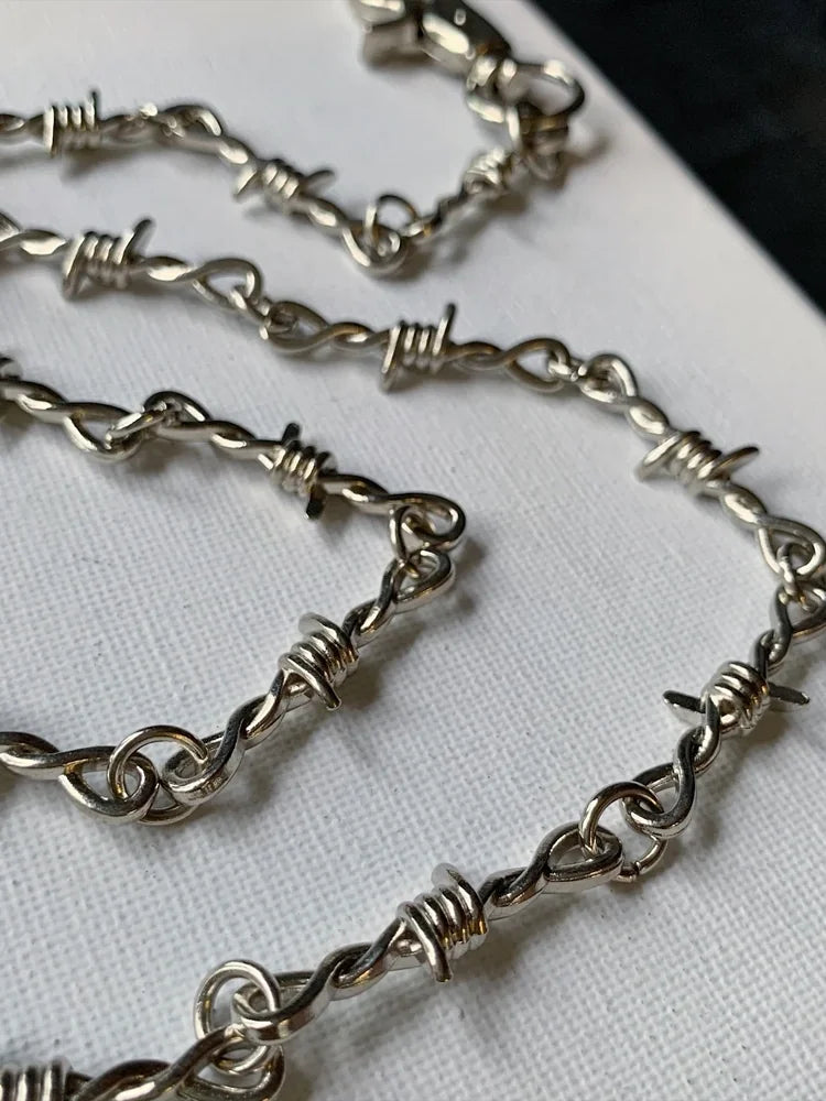 Barbed wire pants chain close-up of wire knots