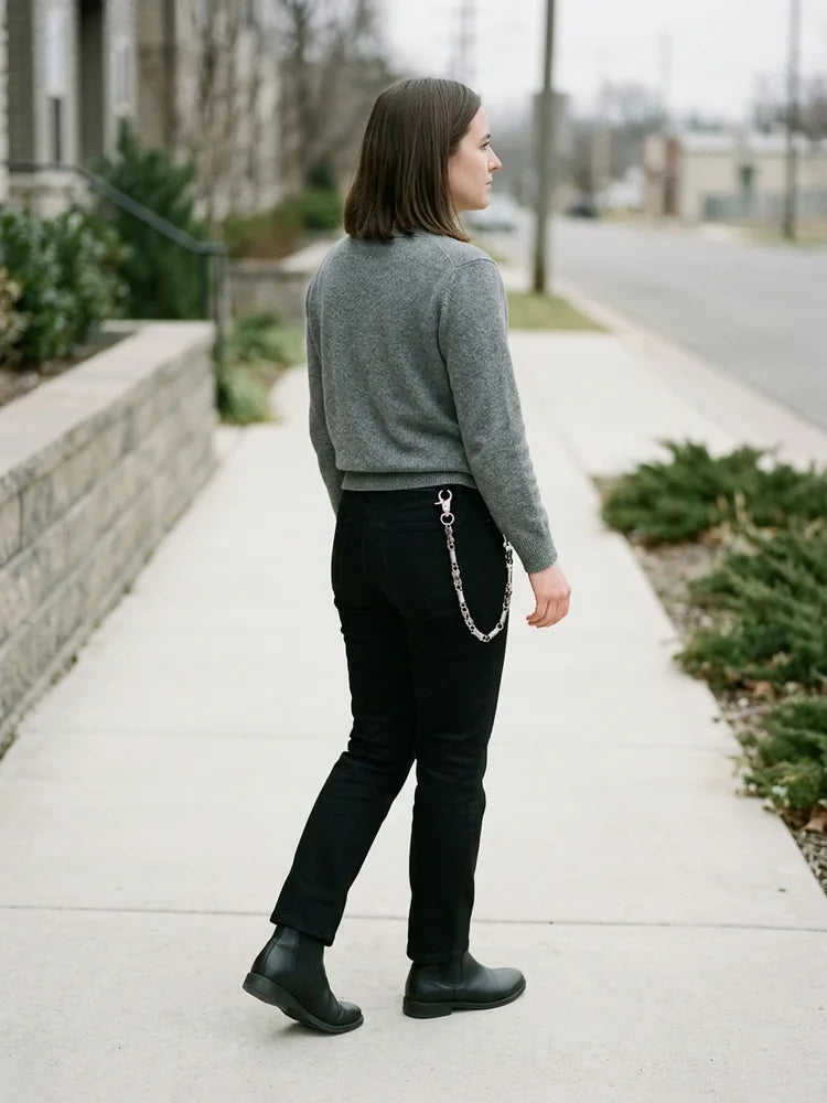 Black jeans outfit with bike chain pants chain, women