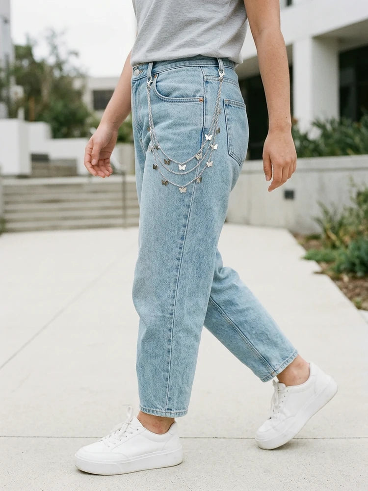 Y2K butterfly jeans chain while walking