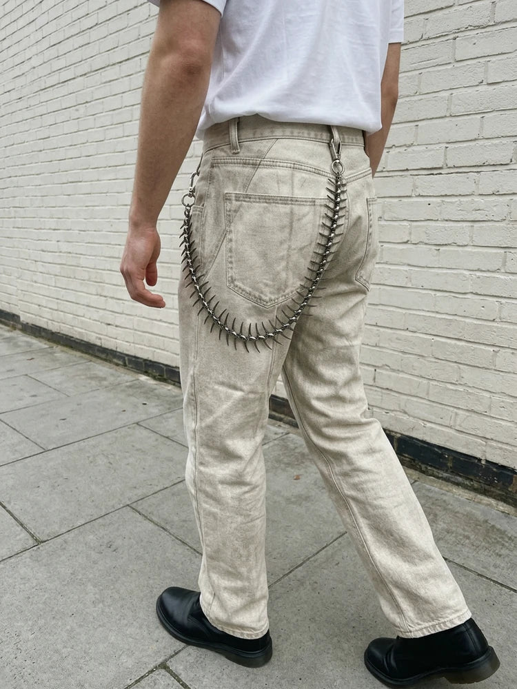 Punk spike jeans chain while walking
