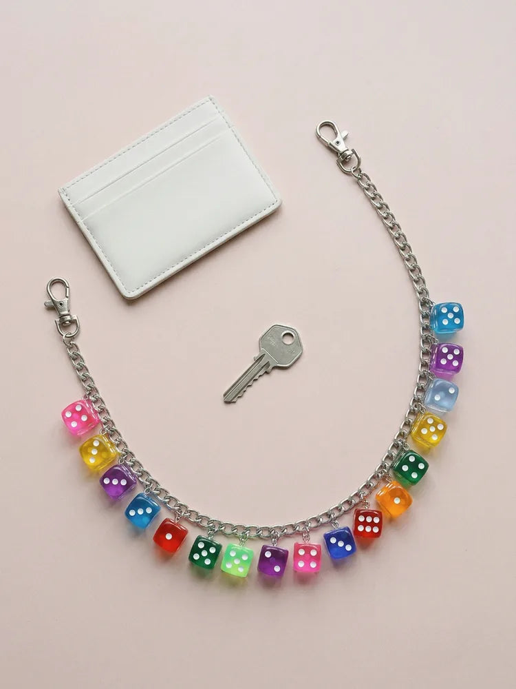 Dice pants chain flat lay with card wallet and key