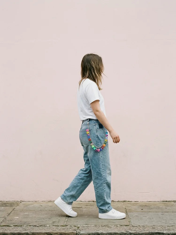 Y2K outfit with colorful dice pants chain, women
