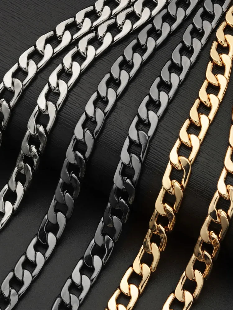 Curb wallet chain close-up in silver, black and gold