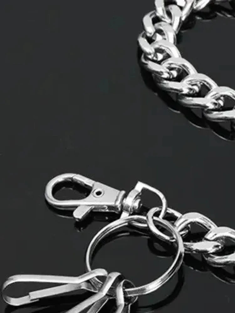 Stainless curb chain close-up of clasp and key ring