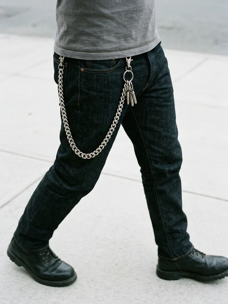 Heavy silver wallet chain while walking in boots