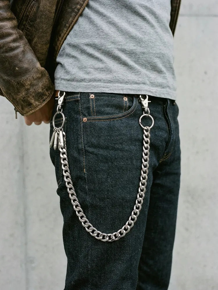 Heavy biker chain worn on raw denim jeans